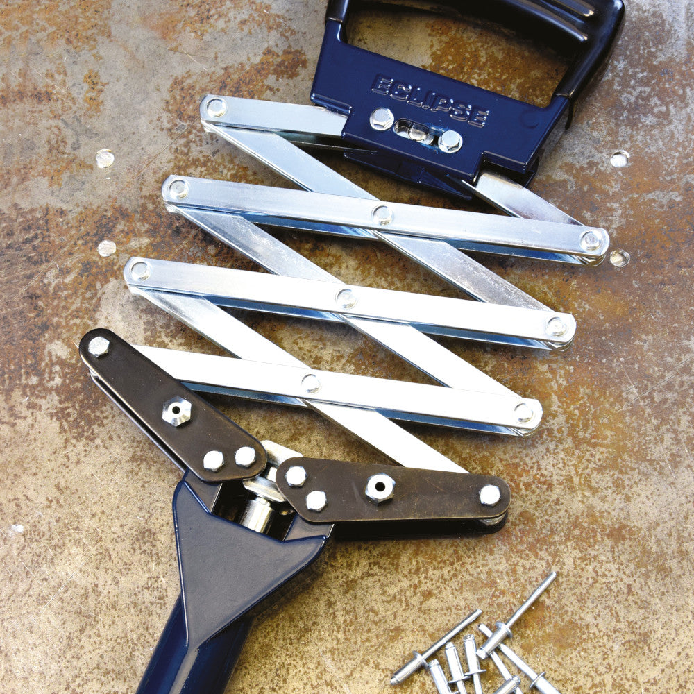 Eclipse Heavy Duty Lazy Tong Riveter 2750HD shown on a textured background with a pile of rivets.