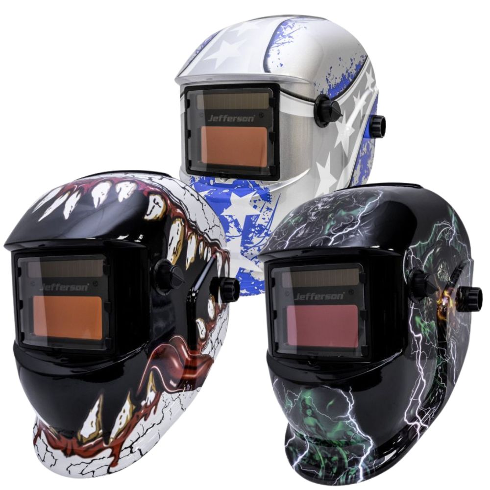 Three welding helmets with different designs on a white background