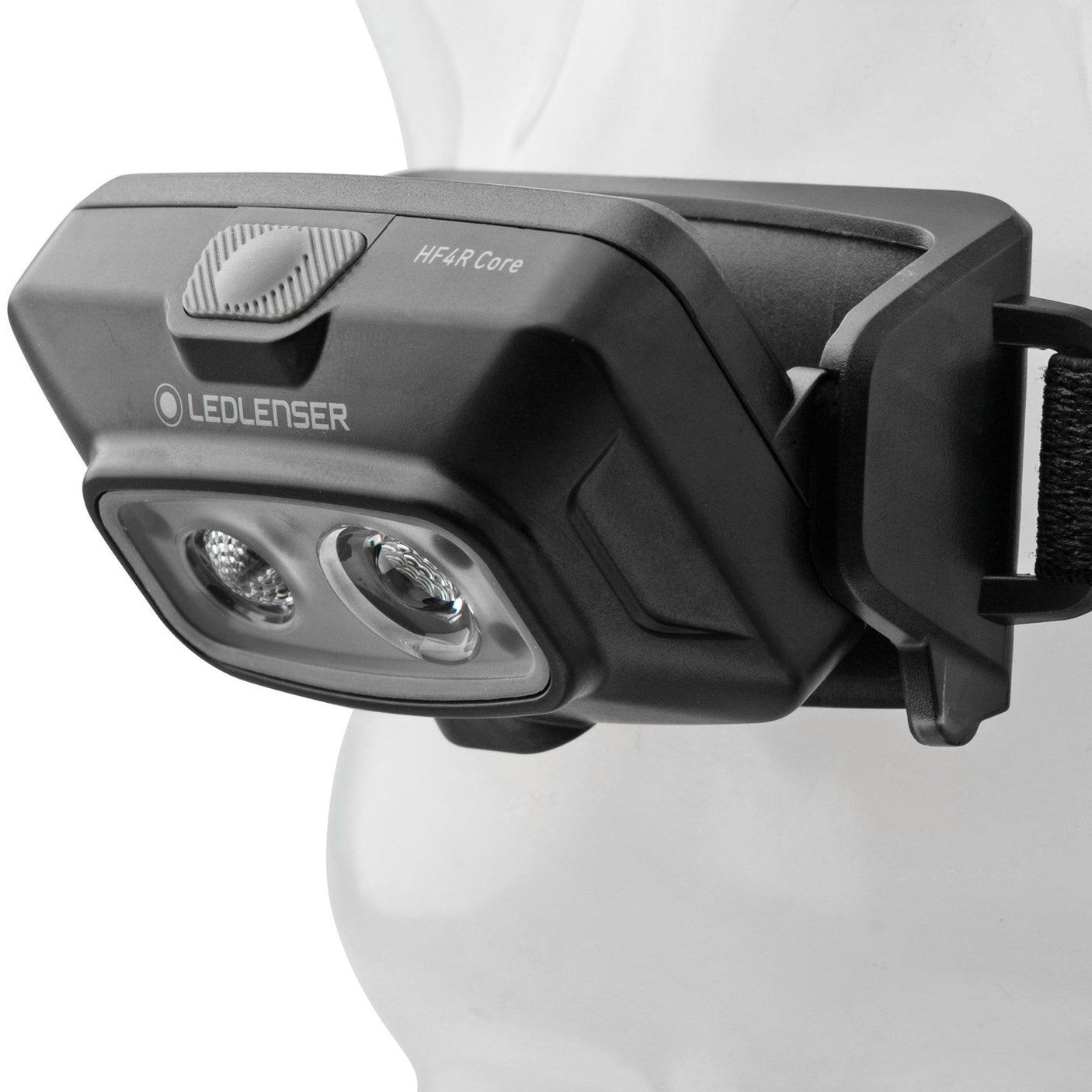 Black LED LENSER HF4R headlamp on a white mannequin head