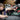Image showing a person attaching the Metabo GPS Tracker to a metabo table saw. He is in a workshop.
