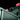 An image of a Metabo Metaloc case with the Metabo GPS Tracker shown attached to lid. The background of the image is black.