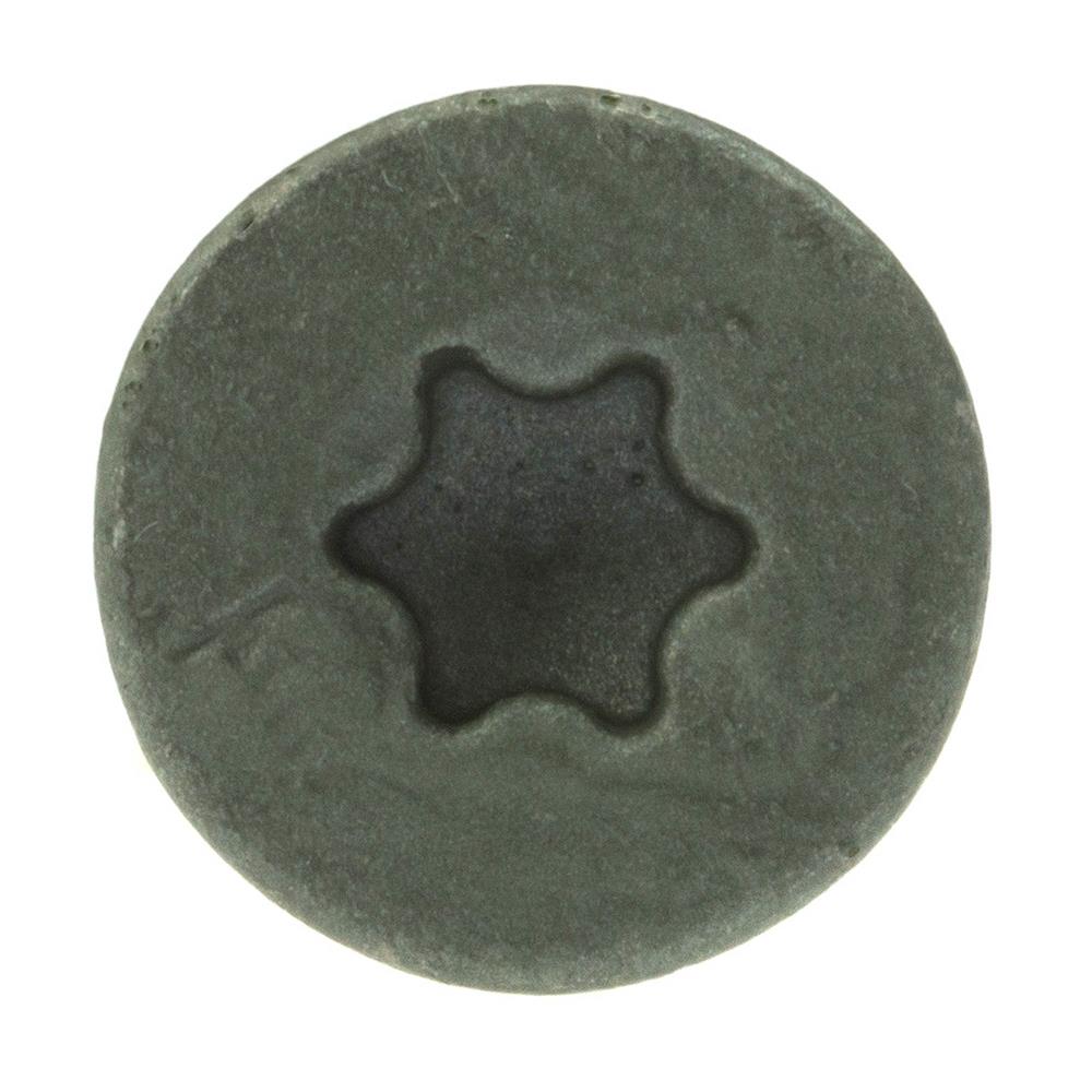 Top down view of screw head showing torx drive on a white background