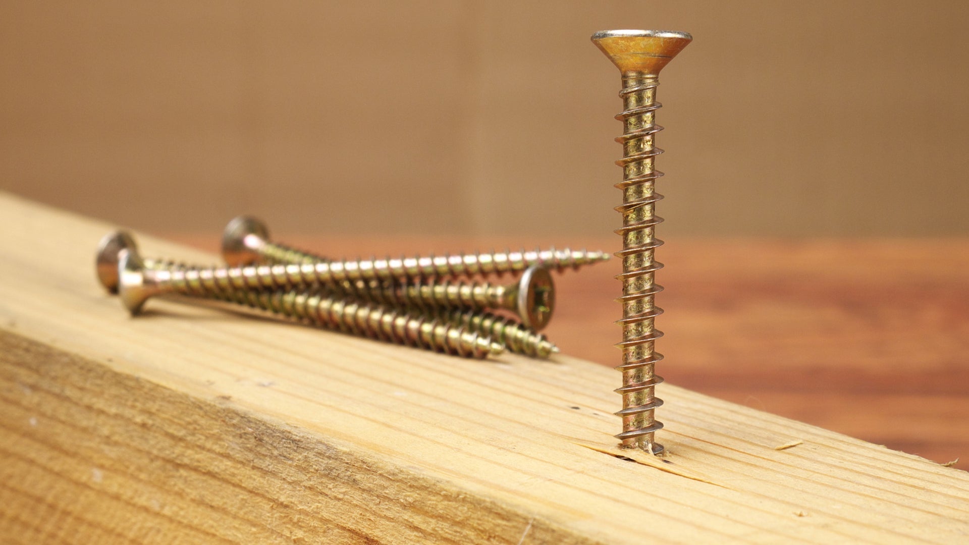 A box of Vortex screws on a plain background