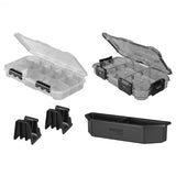 Clear and black plastic storage boxes with components on a white background