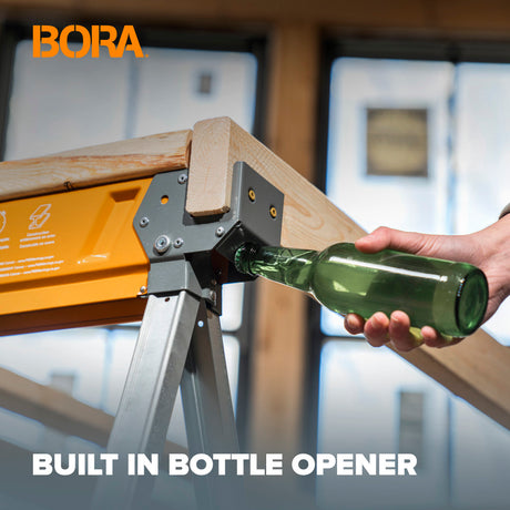 Bottle opener attached to the Bora Workhorse X with a hand holding a bottle, BORA brand visible.