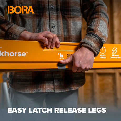 Person holding Bora Workhorse X demonstrating the easy release legs.