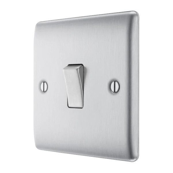 Metallic light switch on a white background
