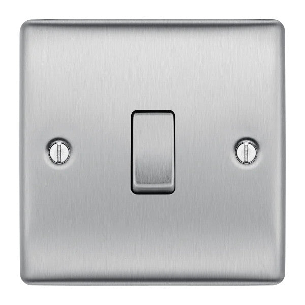 Metallic light switch on a white background