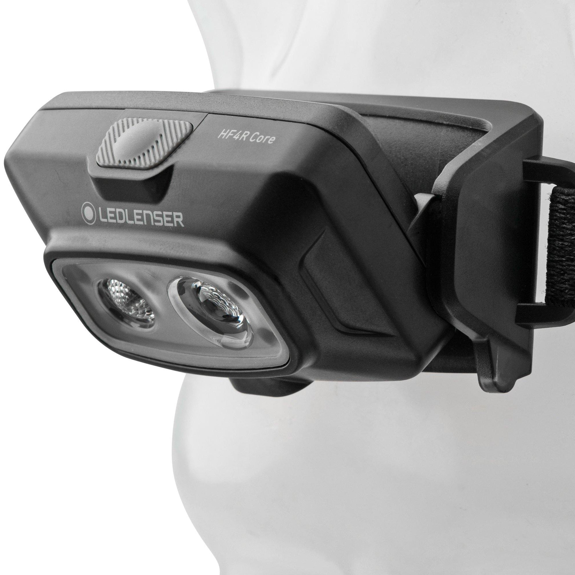 Black LED LENSER HF4R headlamp on a white mannequin head