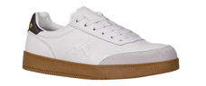 White sneaker with brown sole on a light gray background