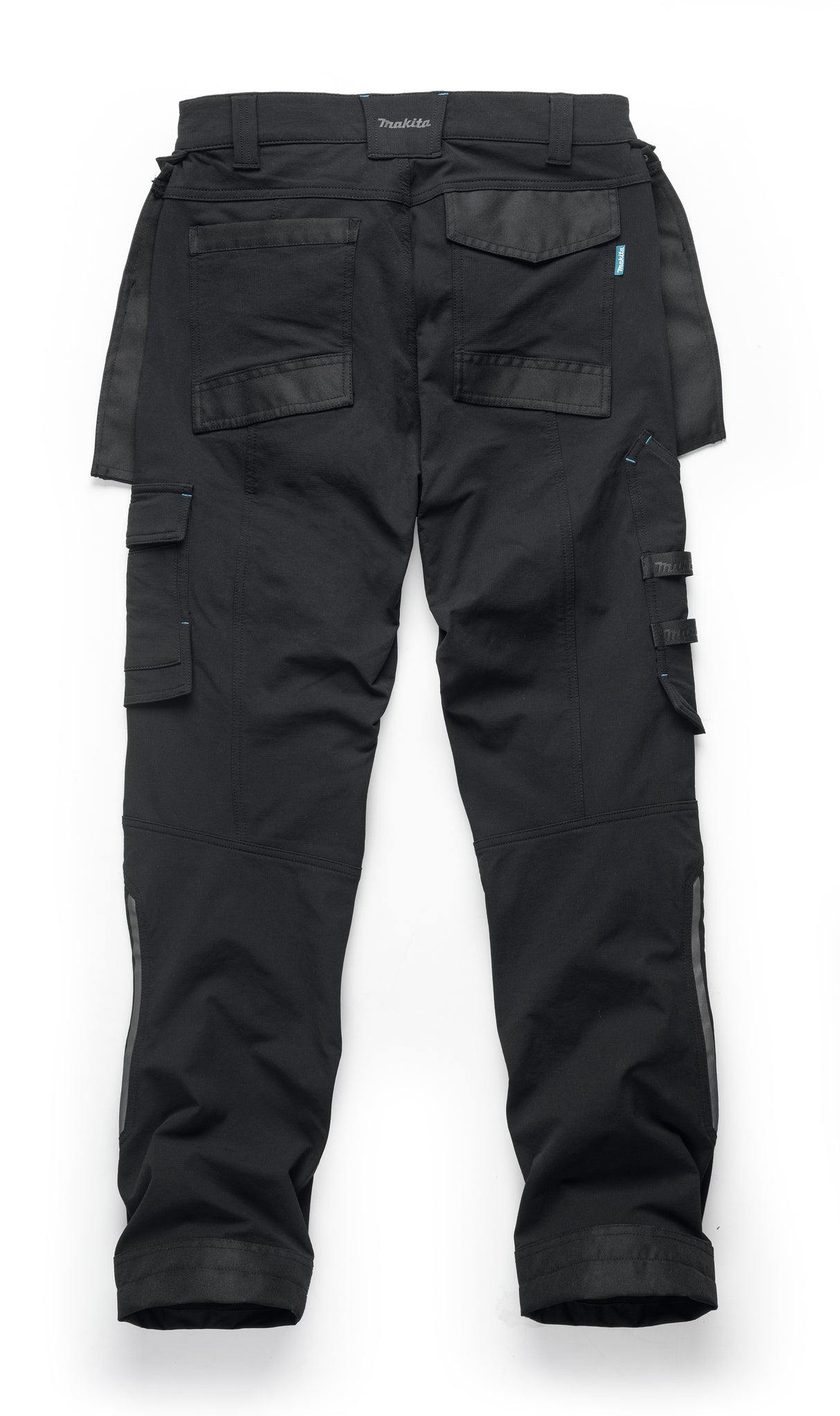 Black Makita Onyx 4 way stretch trousers with multiple pockets on a white background