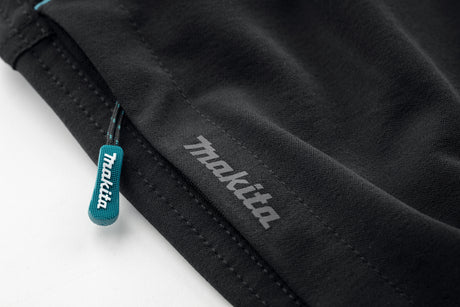 Close up view of the Makita Axis Stretch Jogger showing the Makita logo and tag on a white background.