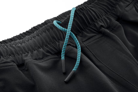 Close-up of the Makita Axis Stretch Jogger showing the blue drawstring on a white background