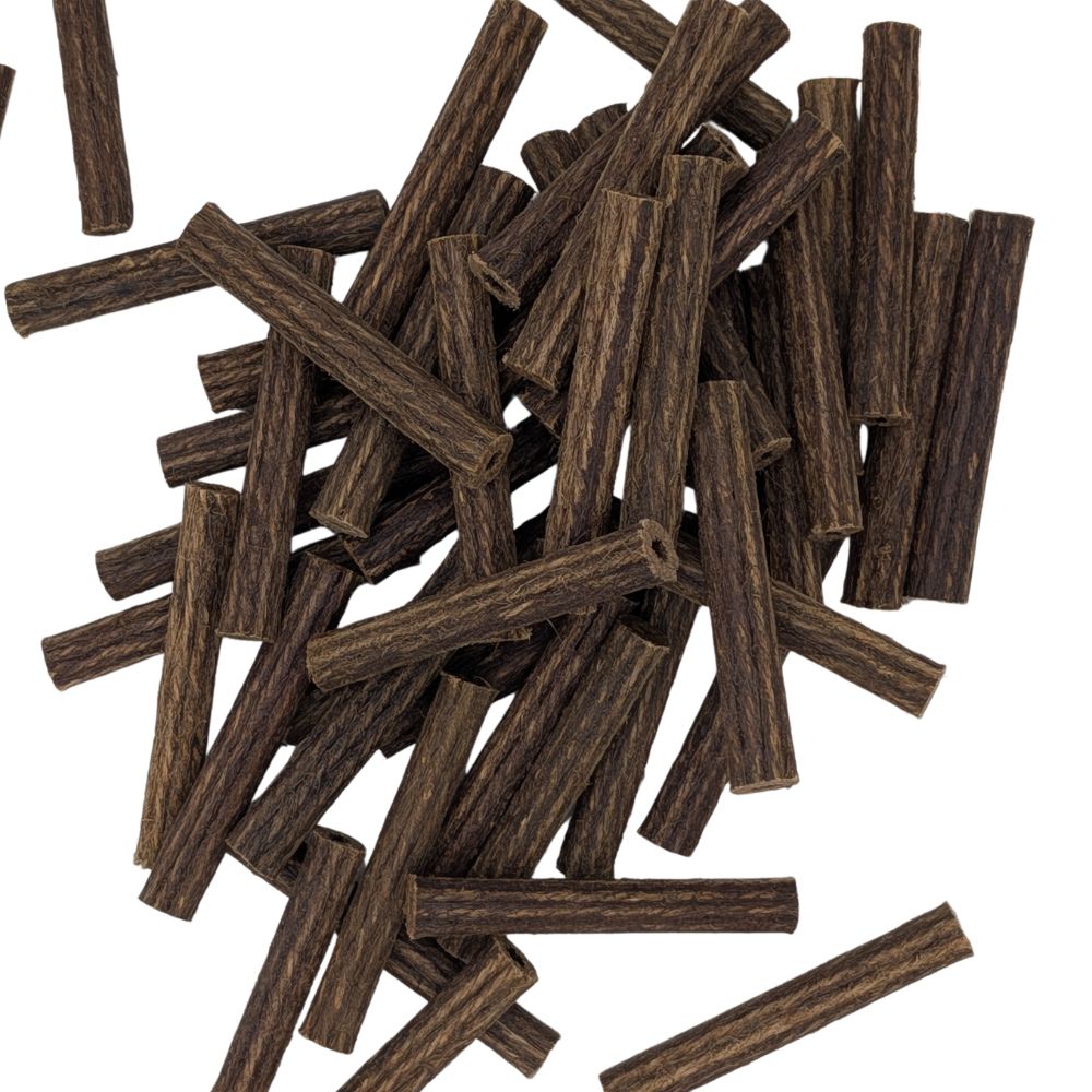 A pile of Rawlplug fibre plugs scattered on a white background.