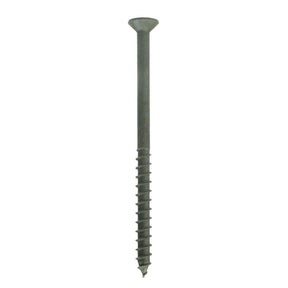 Green screw on a white background