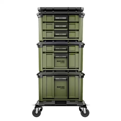 Stack of green Bunker 32261 storage boxes with black lids on a white background