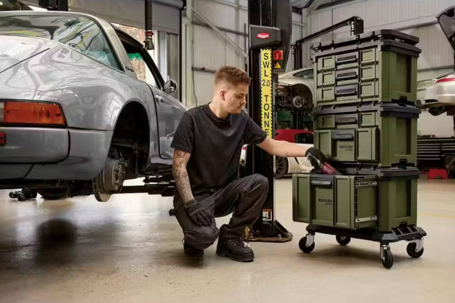 Mechanic with a Bunker Load Up in a garage setting