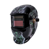Welding helmet with lightning design on a white background