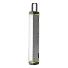 Small rectangular light with a ruler on a white background