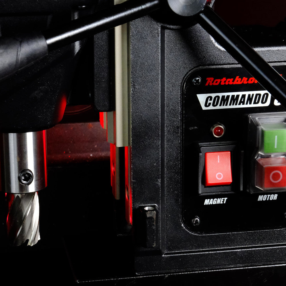 Rotabro Commando machine with control panel and switch on a black background